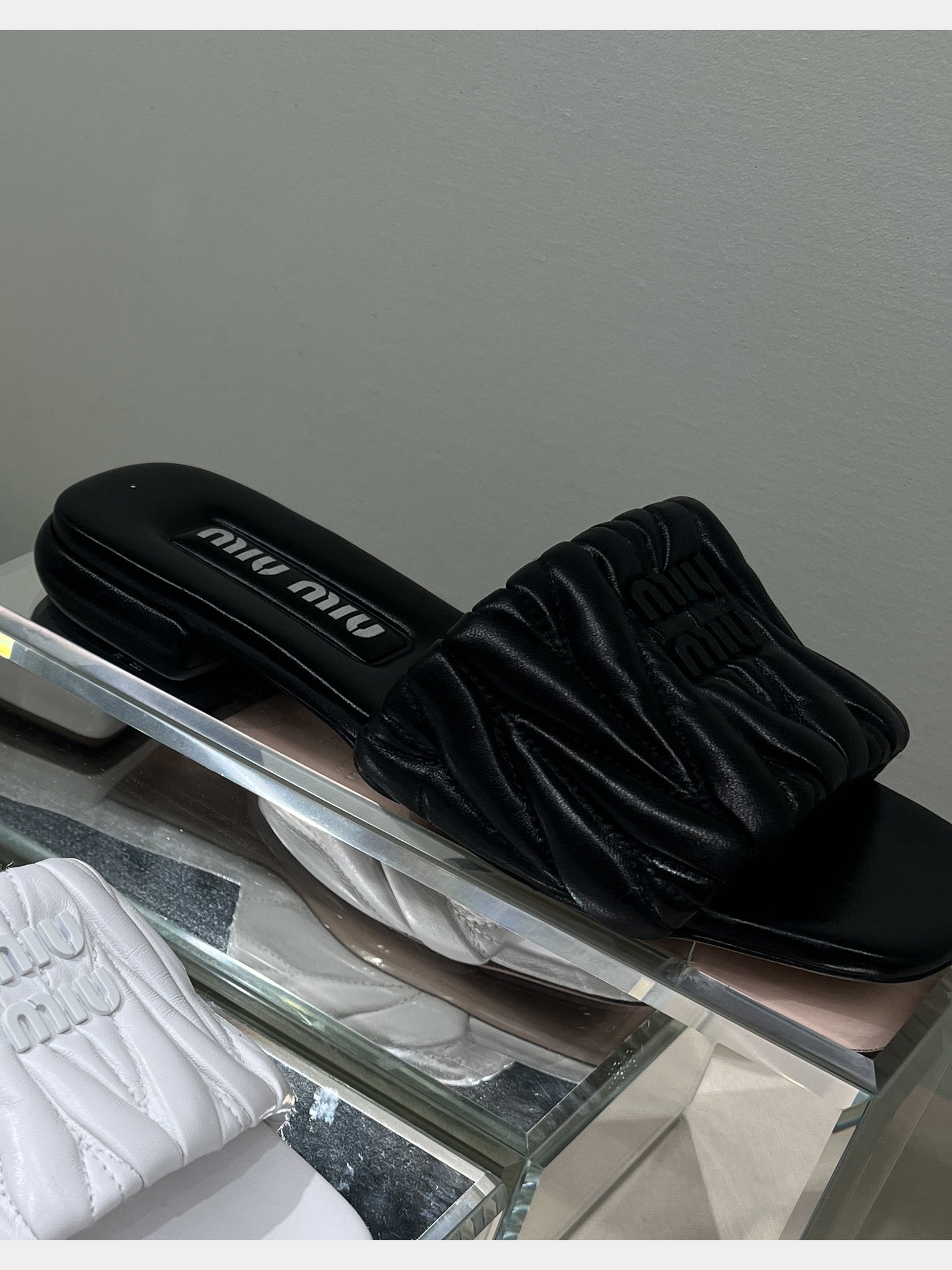 Miu Miu matelassé leather slides blackMiu Miu