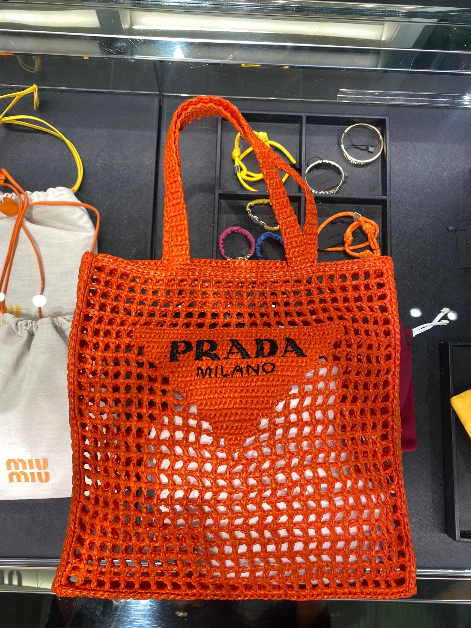Prada Damska torebka pleciona pomarańczowaPrada