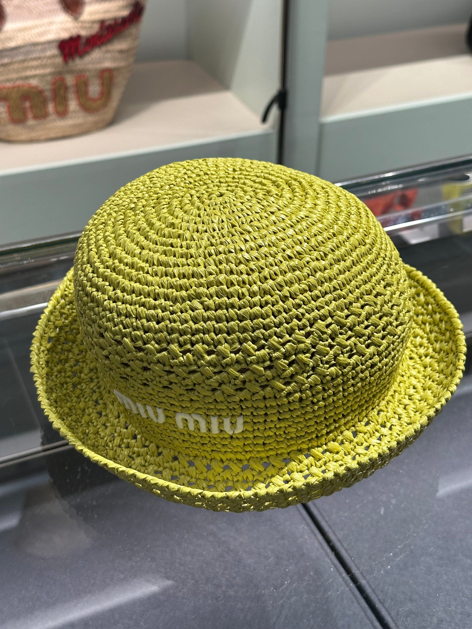 Miu Miu yellow hatMiu Miu
