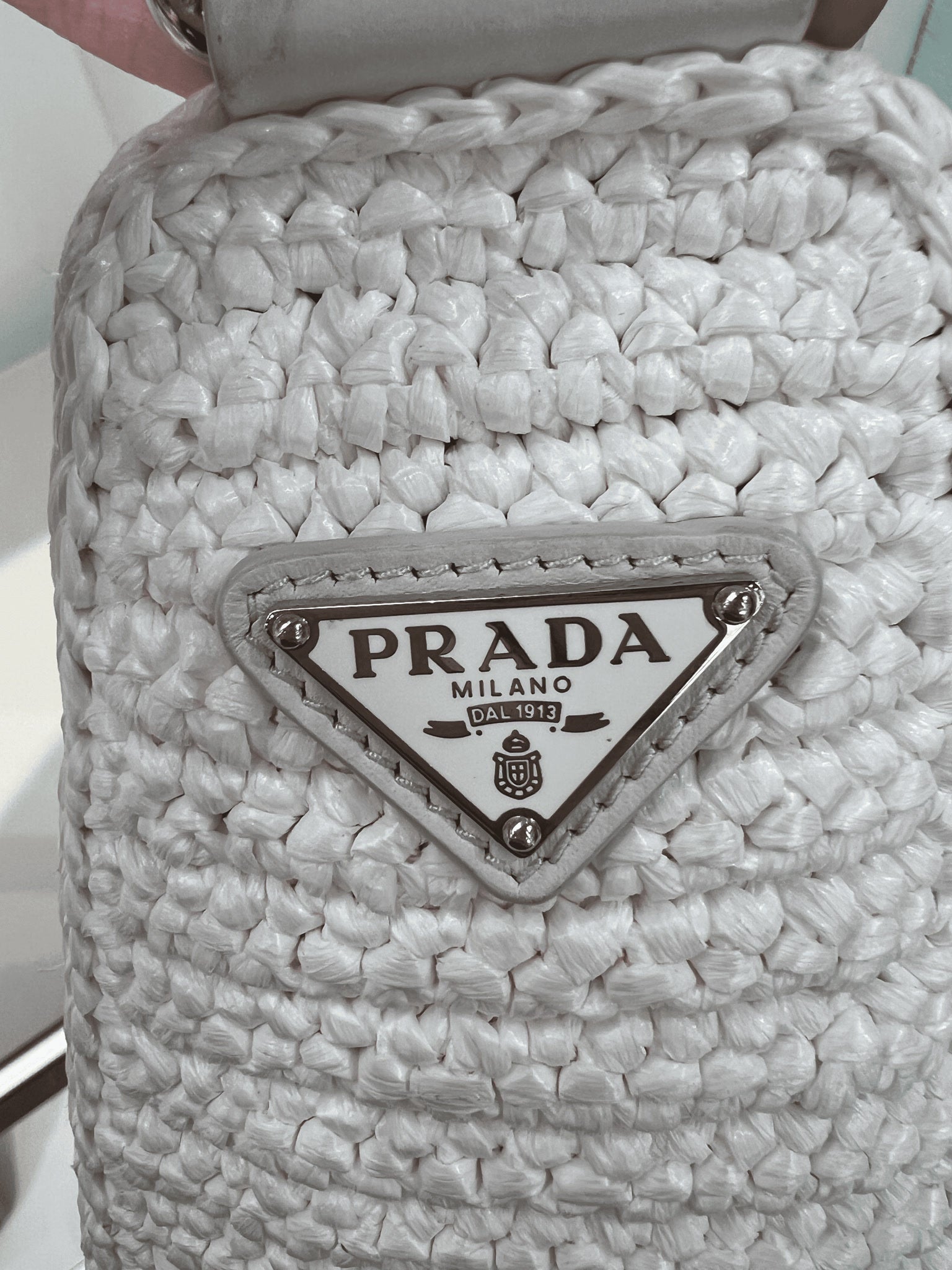 Prada Damska torebka pleciona białaPrada